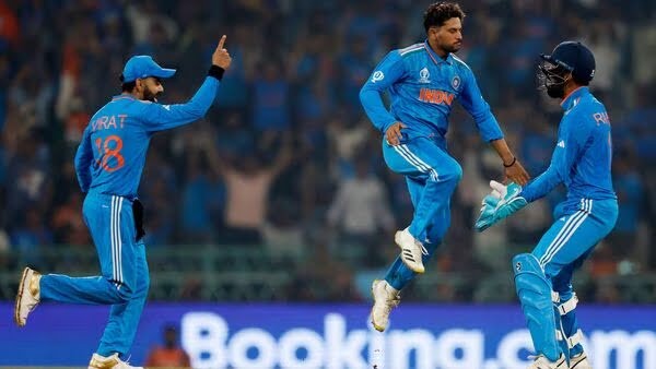 India vs England Highlights, World Cup 2023: Kuldeep Yadav celebrates after taking the LBW wicket of England's Liam Livingstone with KL Rahul and Virat Kohli